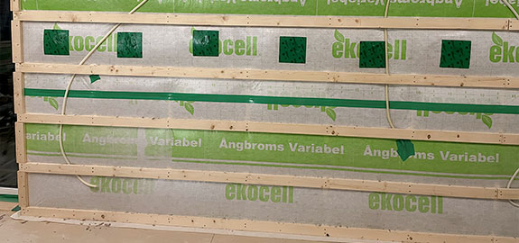 Vägg med lösullsisolering och ångbroms